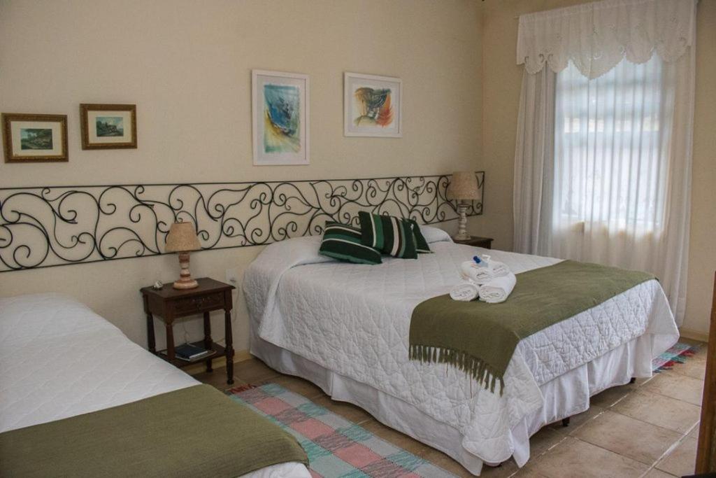 Pousada Hospedaria Da Villa 티라덴티스 객실 사진